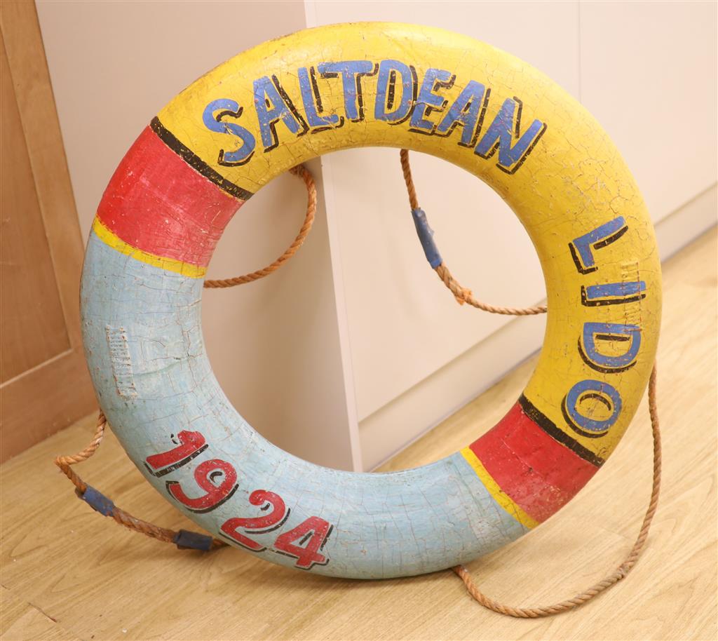 A lifebuoy inscribed Saltdean 1924, diameter 88cm